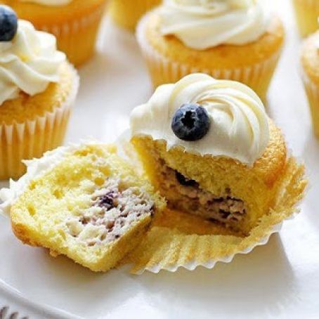 Blueberry Cheesecake-Stuffed Lemon Cupcakes with Vanilla Frosting
